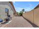 Private backyard with desert landscaping and shade trees at 4519 E Amberwood Dr, Phoenix, AZ 85048