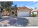 Charming single-story home with well-maintained landscaping and a two-car garage at 4519 E Amberwood Dr, Phoenix, AZ 85048