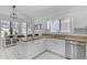 Kitchen with granite countertops, stainless steel appliances, and tiled floors, creating a modern and functional space at 4519 E Amberwood Dr, Phoenix, AZ 85048