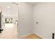 Laundry area with utility hookups and modern flooring, offering convenience and functionality at 4948 E Evans Dr, Scottsdale, AZ 85254