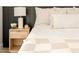 Close up on the main bedroom, featuring a nightstand and modern decor at 4948 E Evans Dr, Scottsdale, AZ 85254
