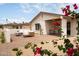 Relaxing outdoor patio space with seating, fire pit, and lovely landscaping, perfect for outdoor enjoyment at 4948 E Evans Dr, Scottsdale, AZ 85254