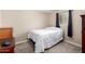 This is a clean bedroom with a single bed and window at 511 E Purdue Ave, Phoenix, AZ 85020