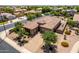 Aerial view of a tile roof home with a paver driveway and well-maintained landscaping at 5446 S Sandstone Ct, Gilbert, AZ 85298