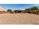 Spacious gravel backyard with a gazebo and ample room for outdoor activities at 5446 S Sandstone Ct, Gilbert, AZ 85298