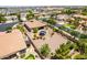 Aerial view of backyard featuring desert landscaping, a charming gazebo, and an artificial putting green at 5446 S Sandstone Ct, Gilbert, AZ 85298