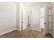 Neutral bedroom with carpet, multiple doorways, and light walls at 5446 S Sandstone Ct, Gilbert, AZ 85298