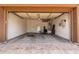 Spacious two car garage with updated doors and concrete floors at 5446 S Sandstone Ct, Gilbert, AZ 85298