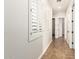 Hallway features clean, neutral decor and tile flooring at 5446 S Sandstone Ct, Gilbert, AZ 85298