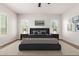 Staged bedroom with plantation shutters and neutral decor at 5446 S Sandstone Ct, Gilbert, AZ 85298
