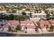 This aerial view highlights the neighborhood's mature landscaping and proximity to community amenities at 579 N Mondel Dr, Gilbert, AZ 85233