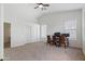 Bedroom with a vaulted ceiling, ceiling fan, and space for a desk or study area at 579 N Mondel Dr, Gilbert, AZ 85233