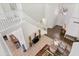 Grand foyer with hardwood floors, large staircase, and decorative details at 579 N Mondel Dr, Gilbert, AZ 85233