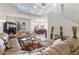Spacious open concept living room that seamlessly connects to the dining area and backyard at 579 N Mondel Dr, Gilbert, AZ 85233