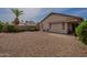 Low maintenance backyard with a palm tree at 5924 W Shangri La Rd, Glendale, AZ 85304