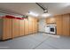 Spacious garage with storage cabinets, washer, and dryer at 5924 W Shangri La Rd, Glendale, AZ 85304