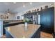 Spacious kitchen island with stainless steel appliances and plenty of storage and countertop space at 5924 W Shangri La Rd, Glendale, AZ 85304
