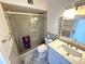 Stylish bathroom featuring a glass-enclosed shower, modern fixtures, and elegant finishes at 6920 E Beverly Ln, Scottsdale, AZ 85254