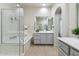 Serene bathroom with a soaking tub, glass-enclosed shower, and double sink vanity offering a spa-like experience at 7221 E Eclipse Dr, Scottsdale, AZ 85266