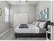 Cozy bedroom featuring a comfortable bed, soft carpet, and sliding door closet at 7221 E Eclipse Dr, Scottsdale, AZ 85266