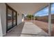Cozy covered patio and spacious backyard, perfect for relaxation and outdoor activities at 743 N Bermuda --, Mesa, AZ 85205