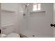 Shower featuring white pebble tile and built in niche at 743 N Bermuda --, Mesa, AZ 85205