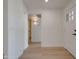 Bright entryway featuring a front door with sidelights, neutral walls, and wood floors at 743 N Bermuda --, Mesa, AZ 85205