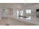 Modern kitchen island with white countertop and stainless steel sink and hardware at 743 N Bermuda --, Mesa, AZ 85205