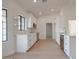 Bright white kitchen featuring stainless steel appliances and quartz countertops at 743 N Bermuda --, Mesa, AZ 85205