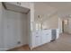 Bright white kitchen with stainless steel appliances and quartz countertops at 743 N Bermuda --, Mesa, AZ 85205