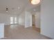 Bright living room with light wood floors, high ceilings, and access to the outdoor patio at 743 N Bermuda --, Mesa, AZ 85205