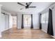 Bright bedroom featuring hardwood floors and two large windows for natural light at 7800 E Lincoln Dr # 2029, Scottsdale, AZ 85250