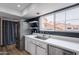 Bright kitchen with stainless steel appliances, a modern sink, and lots of natural light from the window at 7800 E Lincoln Dr # 2029, Scottsdale, AZ 85250