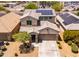 Aerial view of a home featuring solar panels and desert landscaping at 8924 N 102Nd Ln, Peoria, AZ 85345