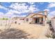 Spacious backyard featuring a covered patio perfect for outdoor entertaining at 8924 N 102Nd Ln, Peoria, AZ 85345