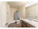 Cozy bathroom featuring a shower-tub combination, a single sink vanity, and neutral decor at 8924 N 102Nd Ln, Peoria, AZ 85345