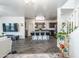 Open floor plan showcasing living room flowing into the kitchen at 8924 N 102Nd Ln, Peoria, AZ 85345