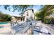 Stunning backyard with pool, fire pit, and comfortable seating at 9669 E Chino Dr, Scottsdale, AZ 85255