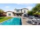 Beautiful backyard with pool, patio, and outdoor seating at 9669 E Chino Dr, Scottsdale, AZ 85255