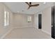 Well-lit bedroom with window; fresh carpet and paint at 9669 E Chino Dr, Scottsdale, AZ 85255