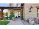 Charming home with lush landscaping and a welcoming front entrance at 9669 E Chino Dr, Scottsdale, AZ 85255
