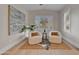 A cozy sitting area includes two chairs, a window with shutters, and a decorative rug at 9669 E Chino Dr, Scottsdale, AZ 85255