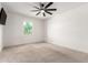 Bedroom with a ceiling fan, carpeted floors and a single window at 9837 E Satellite Dr, Mesa, AZ 85212