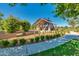 Tranquil community space with covered structure, playground equipment, and scenic walking path at 9837 E Satellite Dr, Mesa, AZ 85212