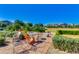 Picturesque park area with seating, manicured landscaping, and serene views, perfect for community enjoyment at 9837 E Satellite Dr, Mesa, AZ 85212