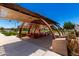 Covered picnic area with tables and benches, offering a shaded spot to enjoy outdoor meals and gatherings at 9837 E Satellite Dr, Mesa, AZ 85212