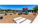 Community playground featuring a slide, colorful geometric shapes, and comfortable seating for parents at 9837 E Satellite Dr, Mesa, AZ 85212