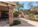 The property's outdoor space includes a covered patio, rock landscaping, and a lizard statue at 10626 N 8Th St, Phoenix, AZ 85020