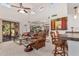 Bright living room with high ceilings, clerestory windows, comfortable seating, and bar area at 10626 N 8Th St, Phoenix, AZ 85020