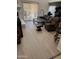 Open living room with hardwood floors, large windows, and comfortable leather furniture at 10626 N 8Th St, Phoenix, AZ 85020